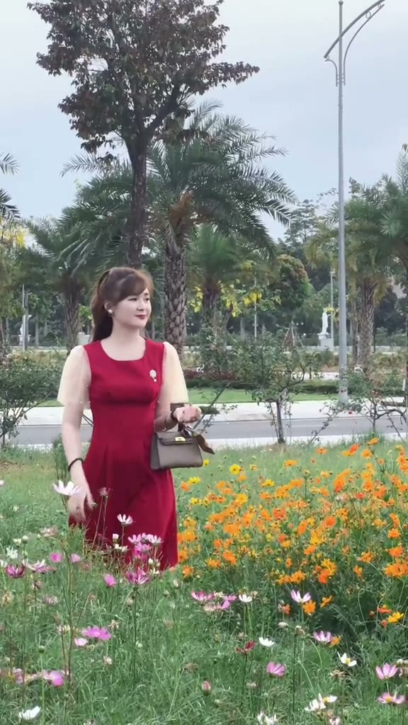 Elegant Red Dress in the Garden